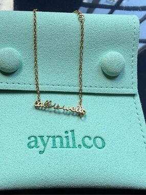 Gold "all is well” Script adjustable bracelet